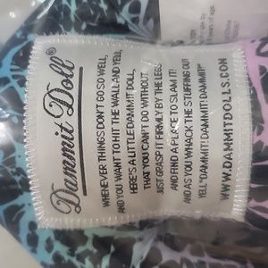 Dammit Doll black, purple, teal, blue, pink